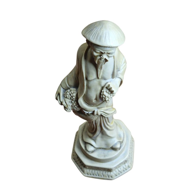Estatueta de monge oriental colhendo uvas – marfinite